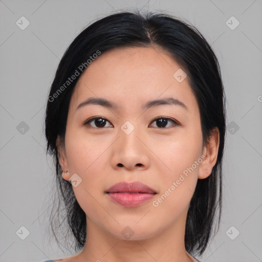 Joyful asian young-adult female with medium  black hair and brown eyes