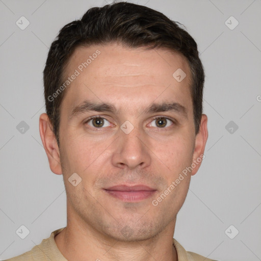 Joyful white adult male with short  brown hair and grey eyes