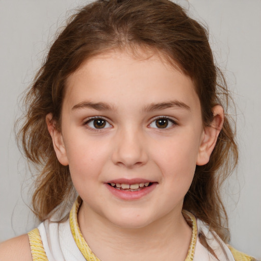 Joyful white child female with medium  brown hair and brown eyes