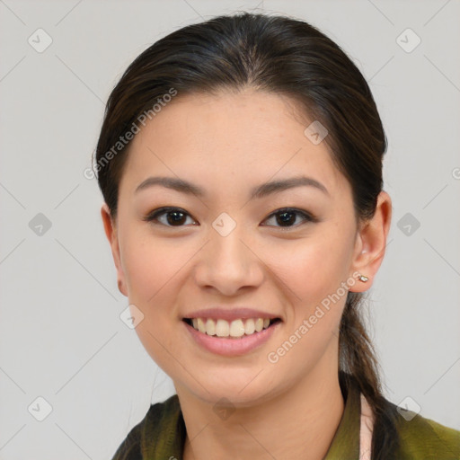 Joyful asian young-adult female with long  brown hair and brown eyes