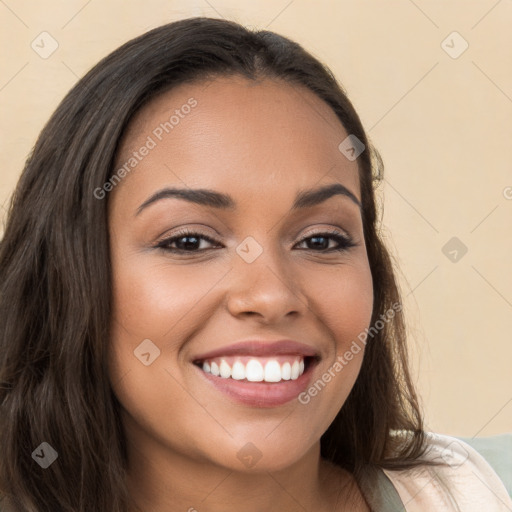 Joyful white young-adult female with long  brown hair and brown eyes