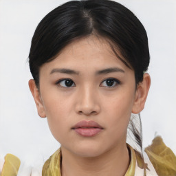 Neutral asian young-adult female with medium  brown hair and brown eyes