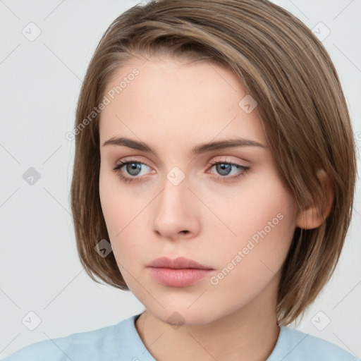 Neutral white young-adult female with medium  brown hair and brown eyes