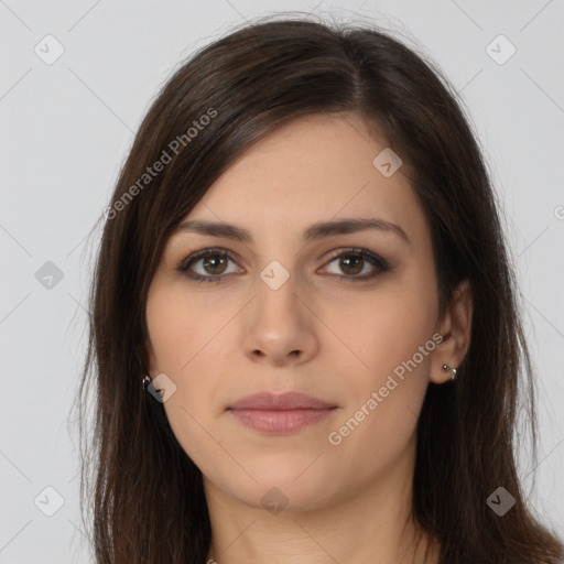 Neutral white young-adult female with long  brown hair and brown eyes