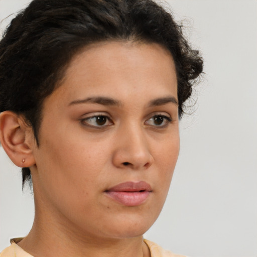Neutral latino young-adult female with short  brown hair and brown eyes