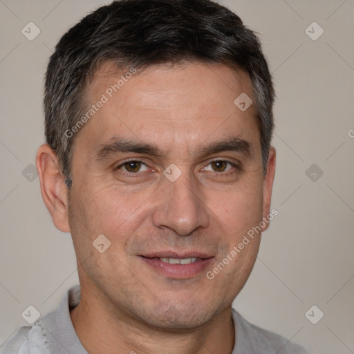 Joyful white adult male with short  brown hair and brown eyes