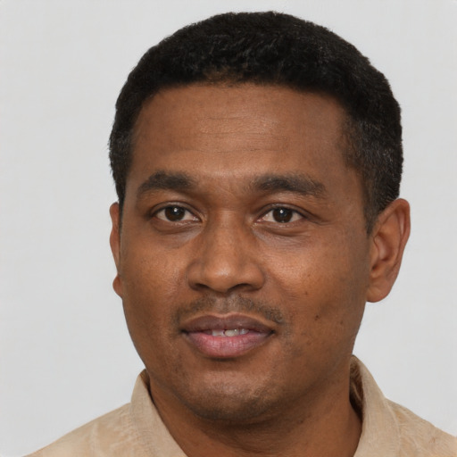 Neutral latino adult male with short  black hair and brown eyes