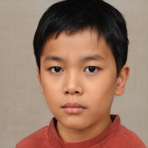 Neutral asian child male with short  brown hair and brown eyes