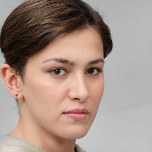 Neutral white young-adult female with medium  brown hair and brown eyes