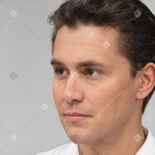 Neutral white adult male with short  brown hair and brown eyes