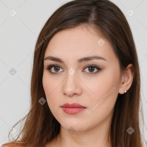 Neutral white young-adult female with long  brown hair and brown eyes