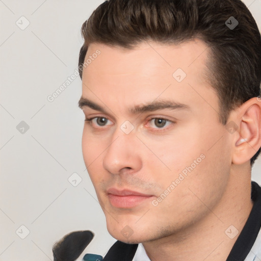 Neutral white young-adult male with short  brown hair and brown eyes