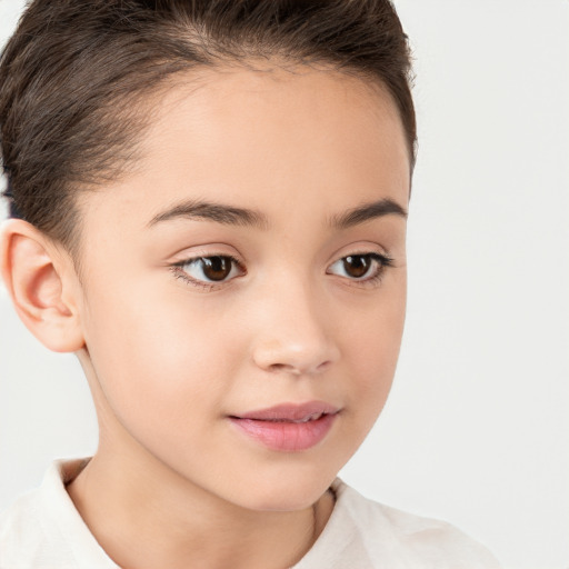 Joyful white child female with short  brown hair and brown eyes