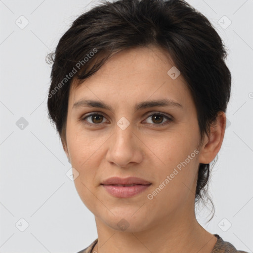 Joyful white young-adult female with medium  brown hair and brown eyes