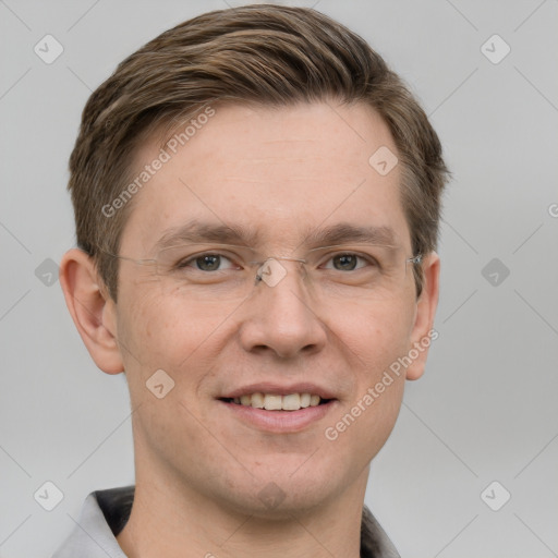 Joyful white adult male with short  brown hair and grey eyes