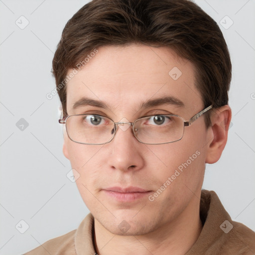 Neutral white young-adult male with short  brown hair and grey eyes