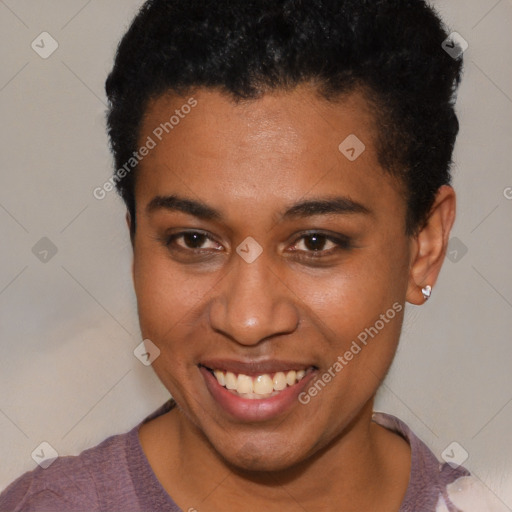 Joyful black young-adult female with short  brown hair and brown eyes