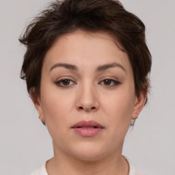 Neutral white young-adult female with short  brown hair and brown eyes