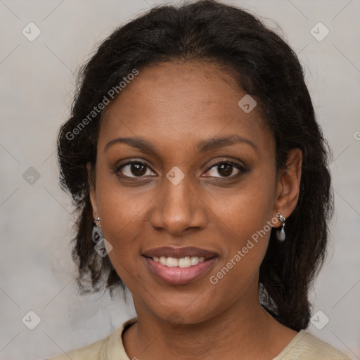 Joyful black young-adult female with medium  brown hair and brown eyes