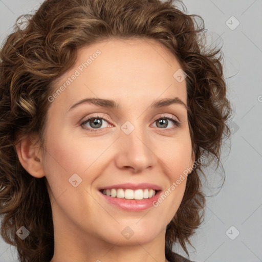 Joyful white young-adult female with medium  brown hair and green eyes