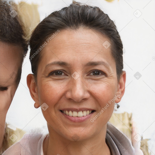 Joyful white adult female with short  brown hair and brown eyes