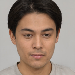 Neutral asian young-adult male with short  brown hair and brown eyes