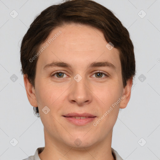 Joyful white adult male with short  brown hair and grey eyes