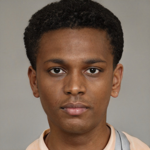 Neutral black young-adult male with short  brown hair and brown eyes