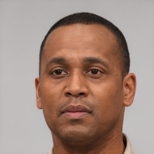 Neutral black adult male with short  black hair and brown eyes