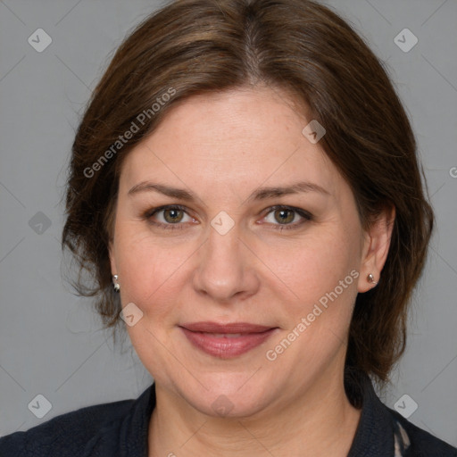 Joyful white adult female with medium  brown hair and grey eyes