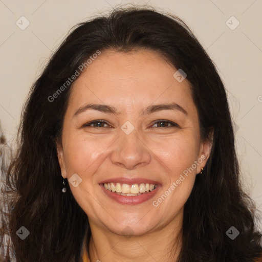 Joyful white adult female with long  brown hair and brown eyes