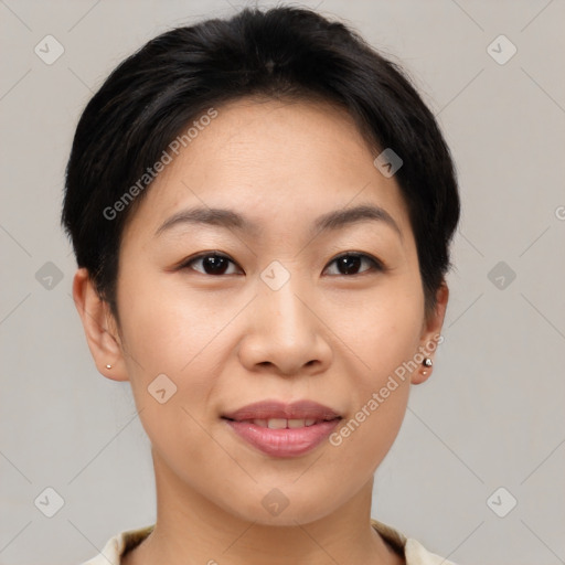 Joyful asian young-adult female with short  brown hair and brown eyes