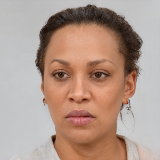 Neutral white adult female with short  brown hair and brown eyes