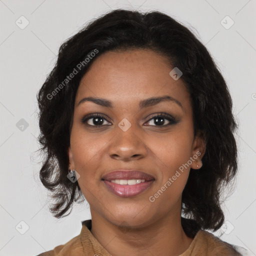 Joyful black young-adult female with medium  brown hair and brown eyes