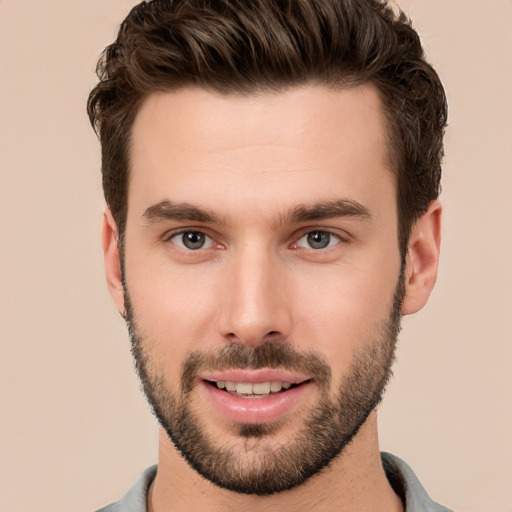 Joyful white young-adult male with short  brown hair and brown eyes