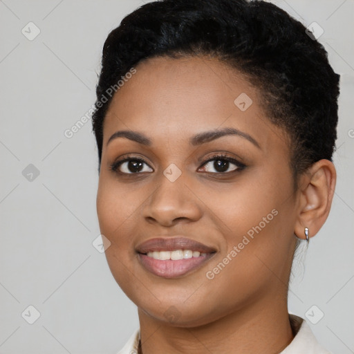 Joyful latino young-adult female with short  black hair and brown eyes