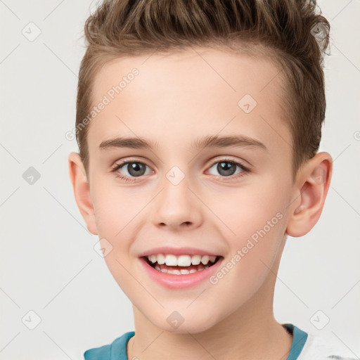 Joyful white child male with short  brown hair and brown eyes