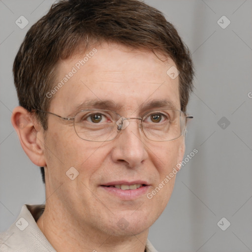 Joyful white adult male with short  brown hair and grey eyes