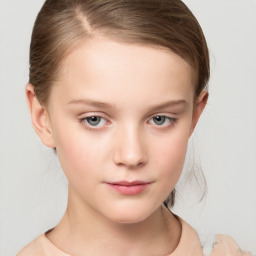 Joyful white child female with medium  brown hair and grey eyes