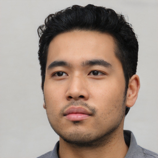 Neutral asian young-adult male with short  black hair and brown eyes