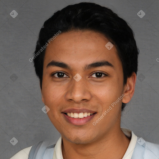 Joyful latino young-adult male with short  black hair and brown eyes