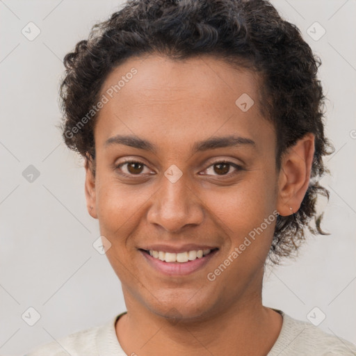 Joyful latino young-adult female with short  brown hair and brown eyes