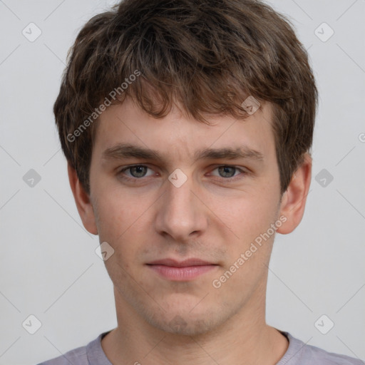 Neutral white young-adult male with short  brown hair and grey eyes