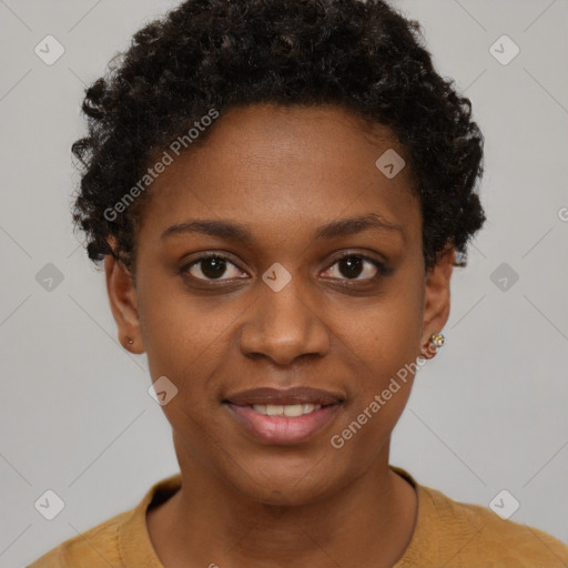 Joyful black young-adult female with short  brown hair and brown eyes