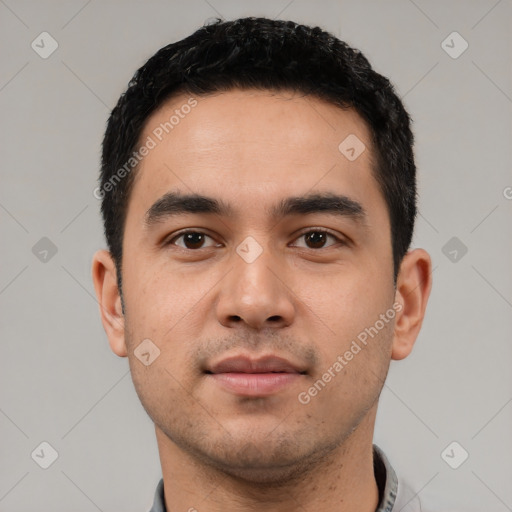 Neutral latino young-adult male with short  black hair and brown eyes