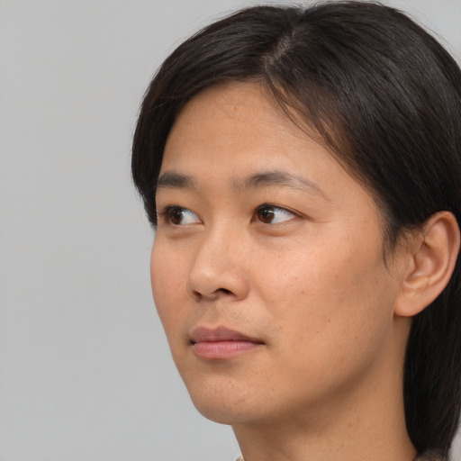 Neutral asian young-adult male with short  brown hair and brown eyes
