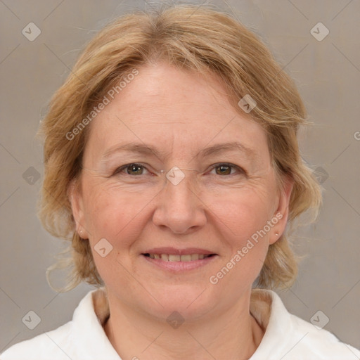 Joyful white adult female with medium  brown hair and blue eyes