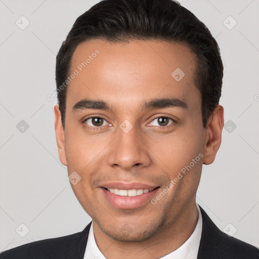 Joyful white young-adult male with short  black hair and brown eyes