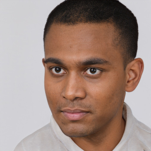 Neutral latino young-adult male with short  brown hair and brown eyes