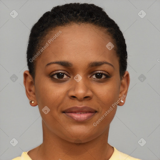 Joyful black young-adult female with short  brown hair and brown eyes